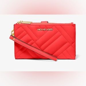 Michael Kors Orange quilted leather wallet with phone case